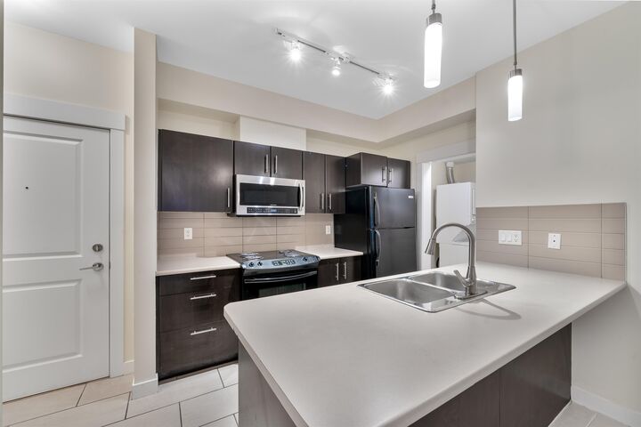 Property Photo: 33545 Rainbow Avenue 217 BC V2S 1E6