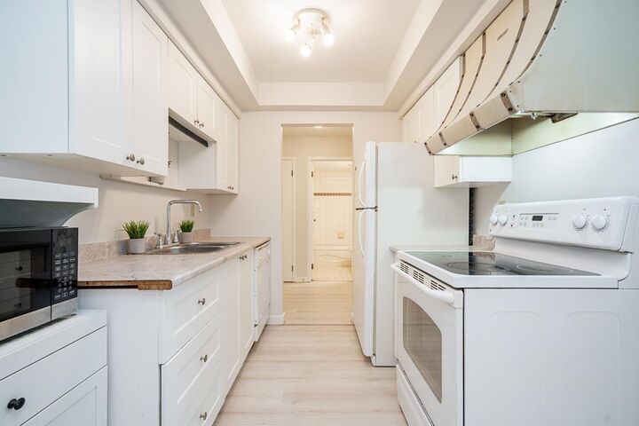 Property Photo:  33956 Essendene Avenue 106  BC V2S 6E7 