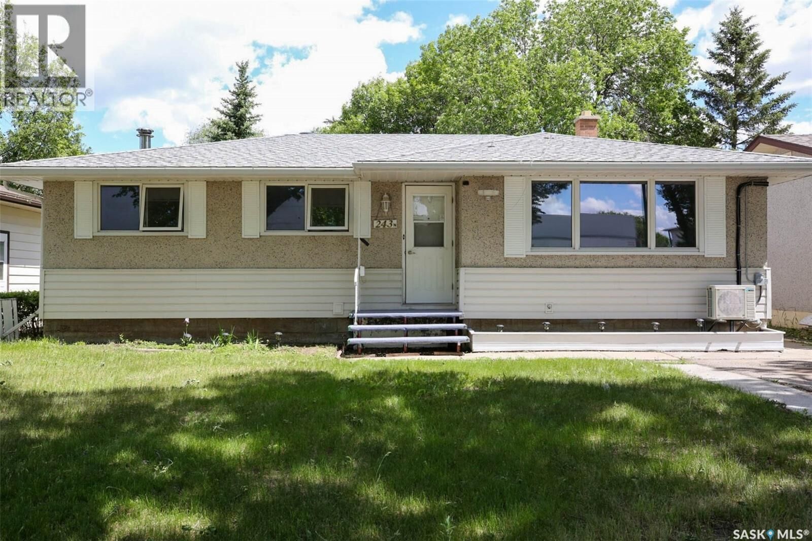 Property Photo: 243 Smith Street N SK S4R 3B5