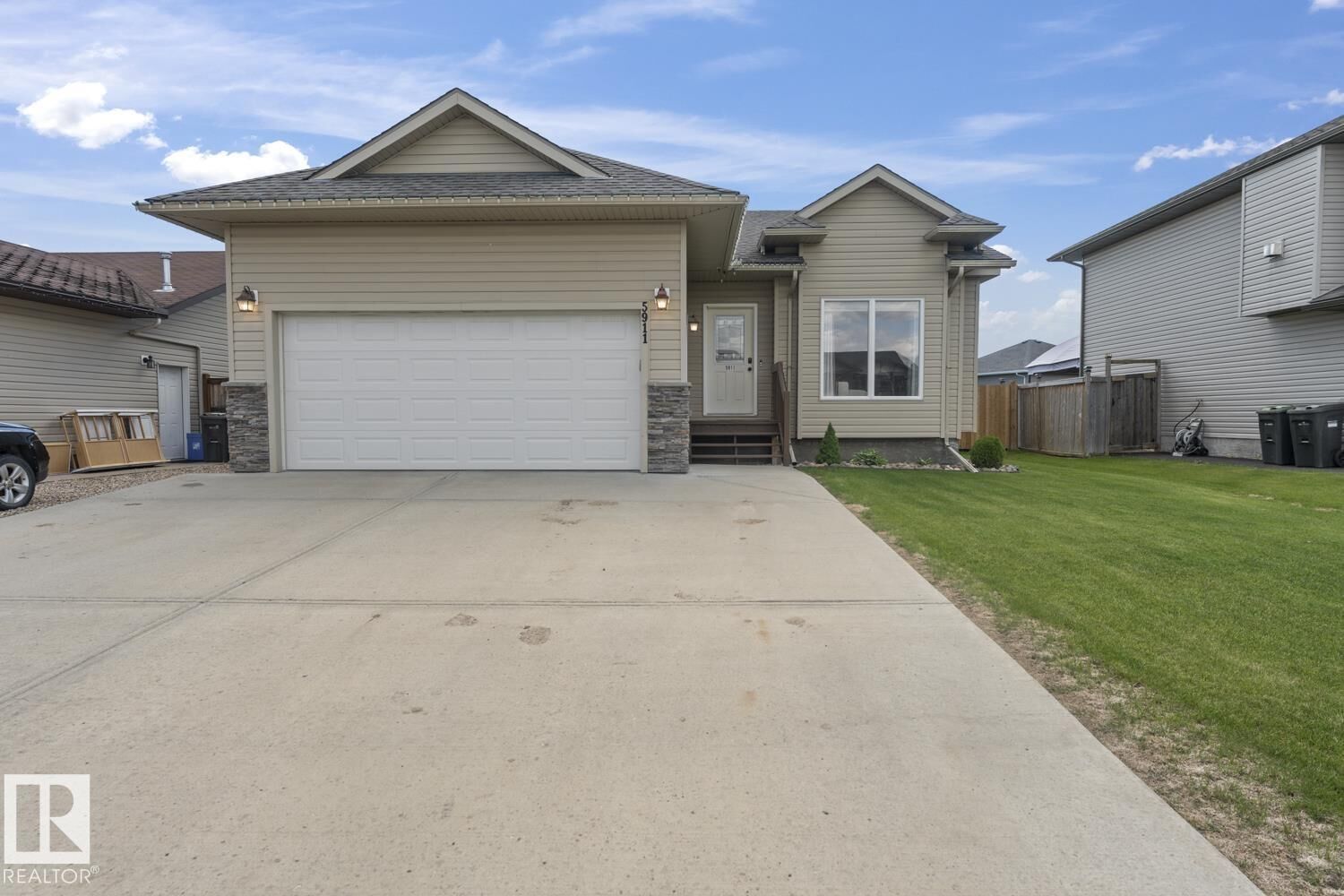 Property Photo:  5911 Meadow Way  AB T9M 0C2 