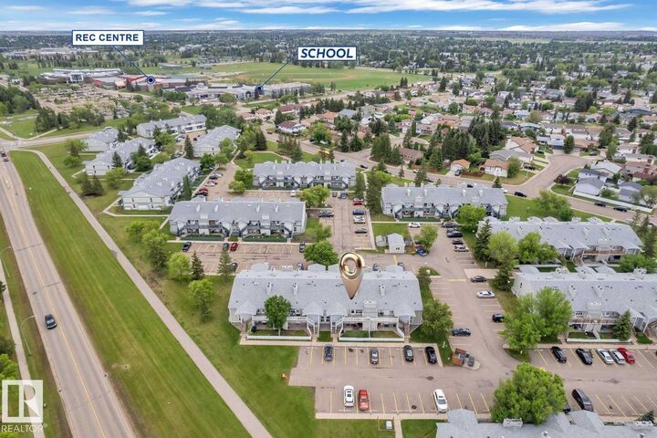 Property Photo: 2703 79 Street NW 164 AB T6K 3Z6