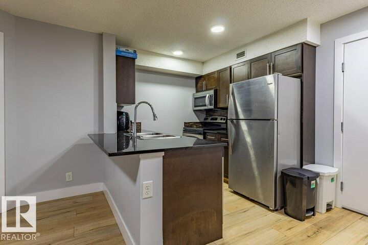 Property Photo:  11820 22 Avenue SW 306  AB T6W 2A2 
