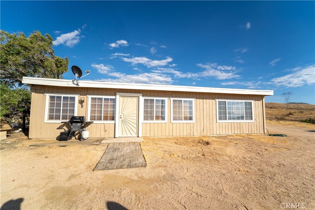 Property Photo:  8390 Milpas  CA 92308 