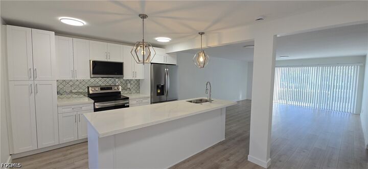 Property Photo: 1404 SE 40th Street A-3 FL 33904