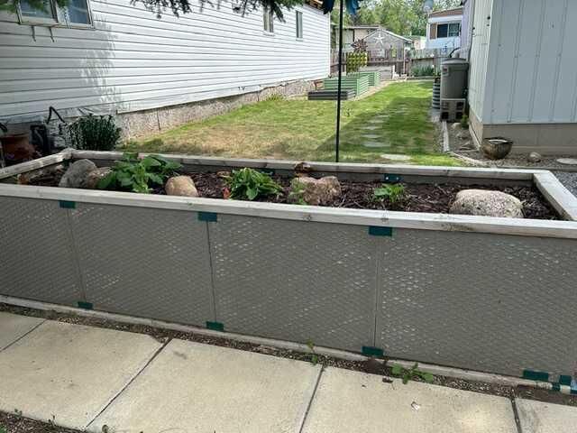 Property Photo: 56 Greenbrook Village E AB T1R 0R7