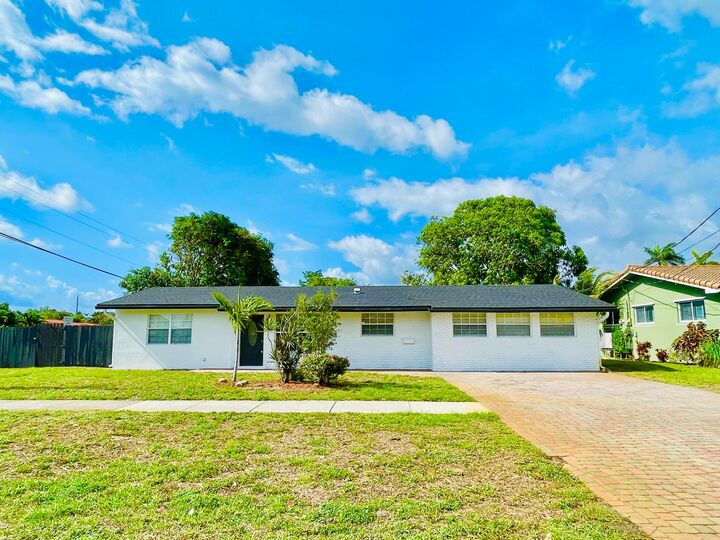 Property Photo:  1478 NE 56th Street  FL 33334 