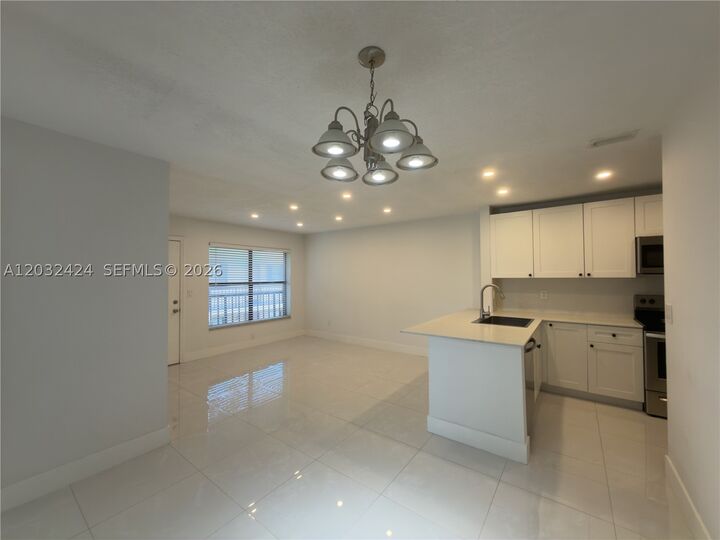 Property Photo:  2500 W 67th Pl 21-26  FL 33016 
