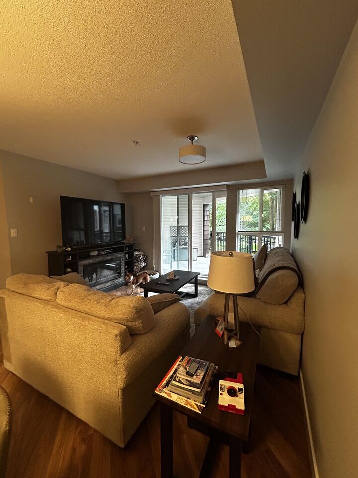 Property Photo:  19677 Meadow Gardens Way 209  BC V3Y 1Z2 