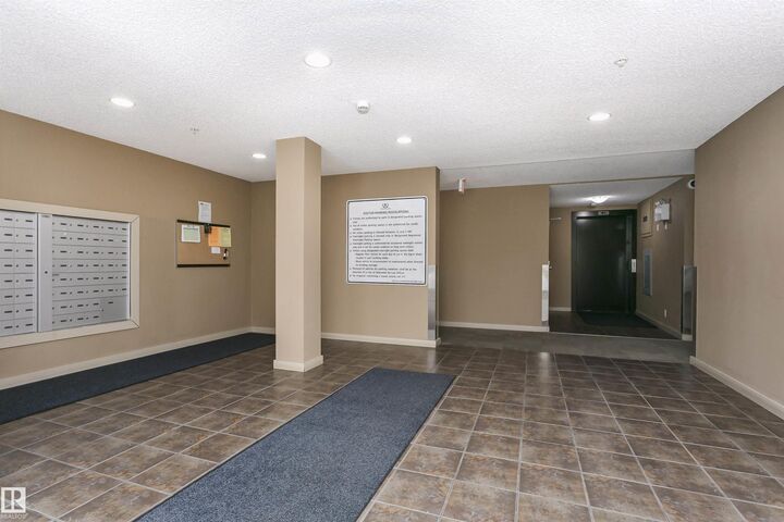 Property Photo:  12045 22 Avenue SW 404  AB T6W 2Y2 