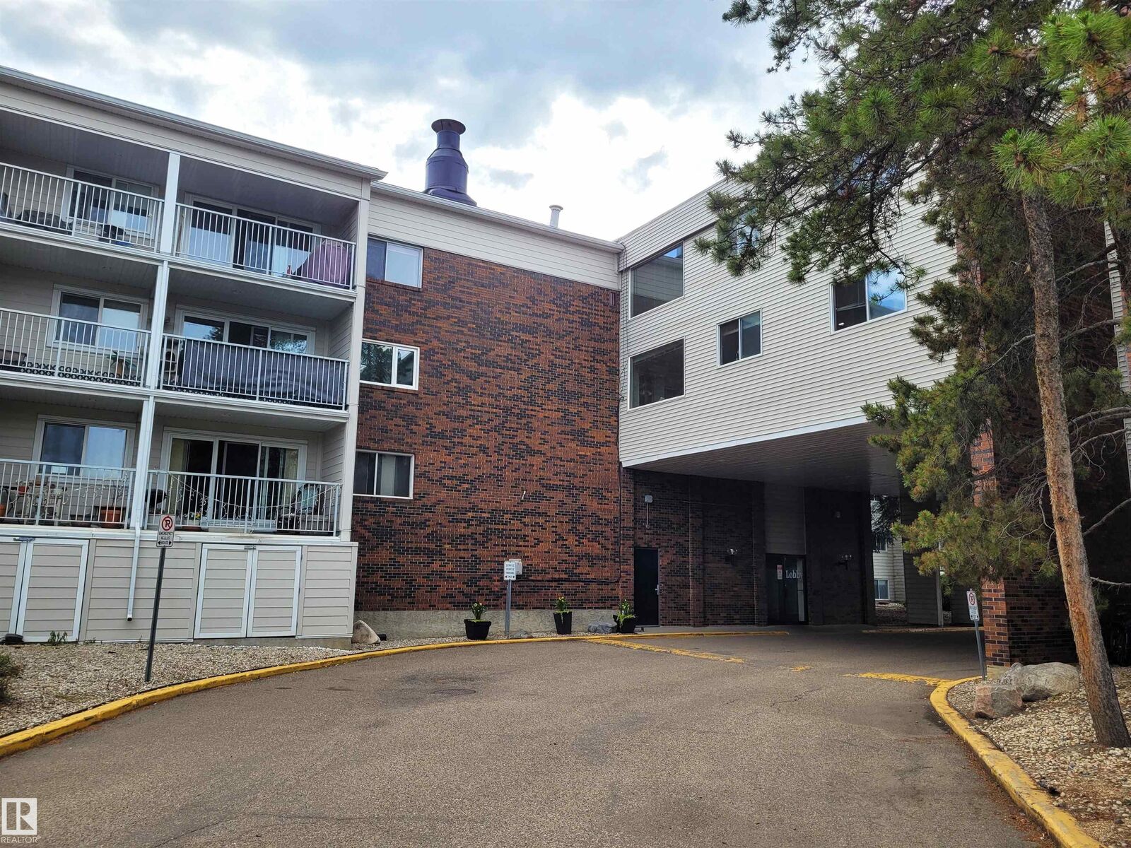 Property Photo:  4404 122 Street NW 235  AB T6H 4E2 