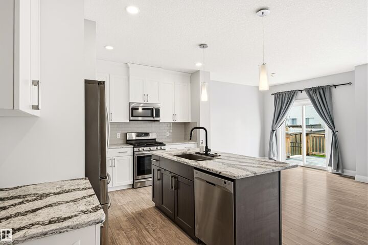 Property Photo:  102 Meadowland Way  AB T7X 0S4 