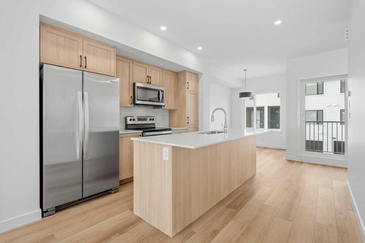 Property Photo: 25 Wildwoods Court SW 1408 AB T4B 5V7