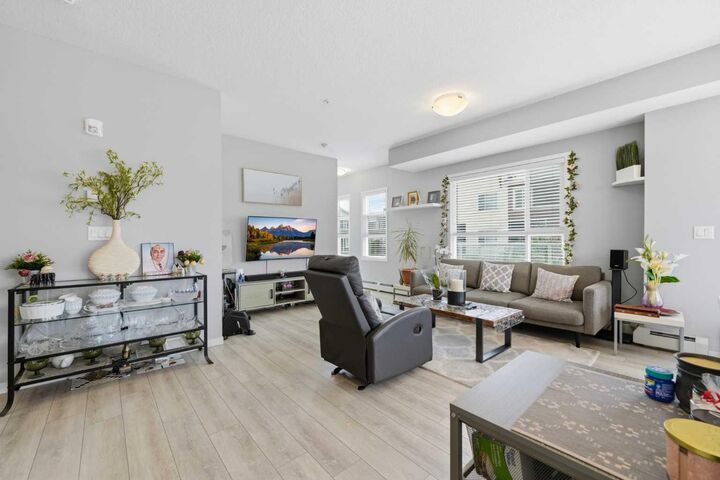 Property Photo: 370 Harvest Hills Common NE 210 AB T3K 2M8