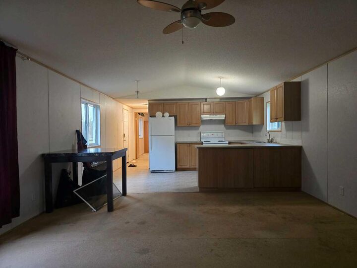 Property Photo: 72133 Range Road 11 302 AB T0H 1B0