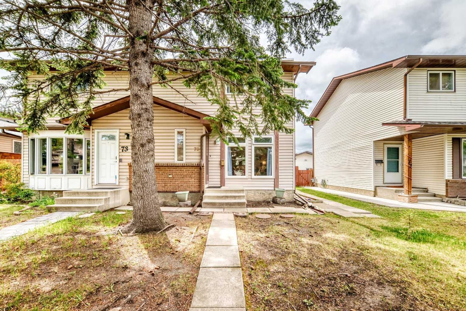 Property Photo: 75 Cedardale Crescent SW AB T2W 4B2