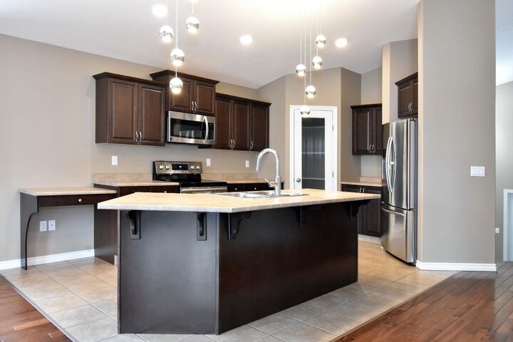 Property Photo:  10402 128 Avenue  AB T8V 6J5 