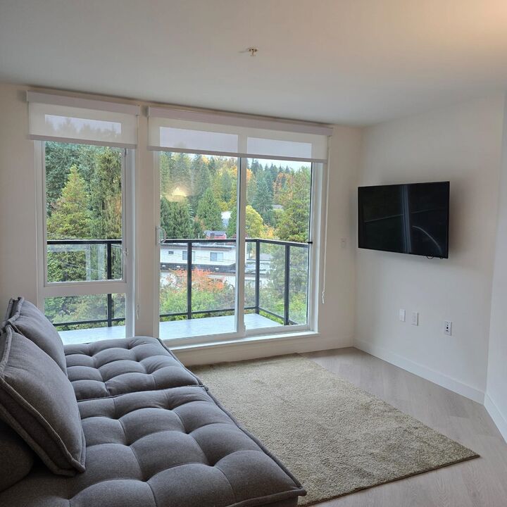 Property Photo: 1100 Clarke Road 406 BC V3H 0N3