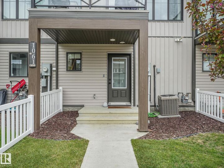 Property Photo:  1061 Cy Becker Rd NW  AB T5Y 4B7 
