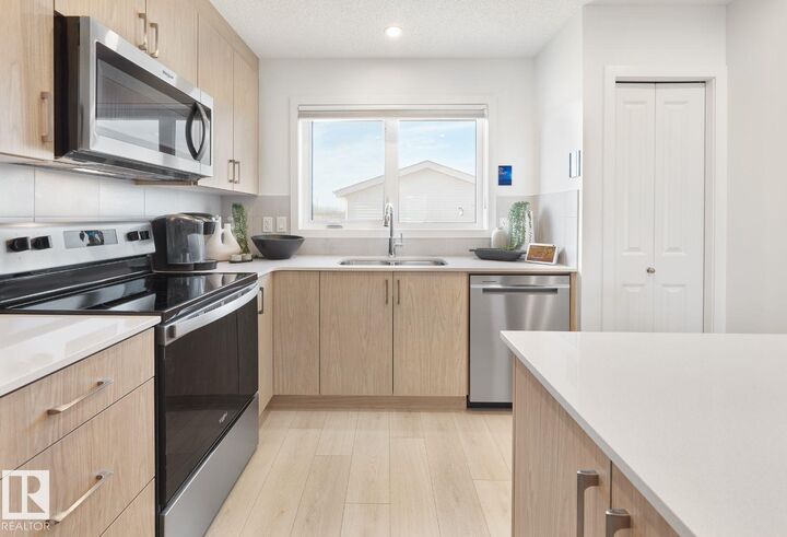 Property Photo: 21136 25 Avenue NW AB T6M 3H1
