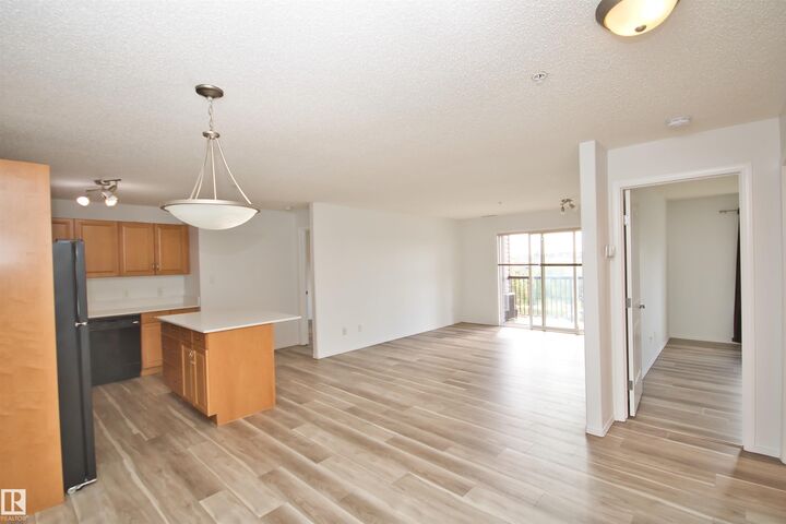 Property Photo: 2098 Blackmud Creek Drive SW 311 AB T6W 1T7