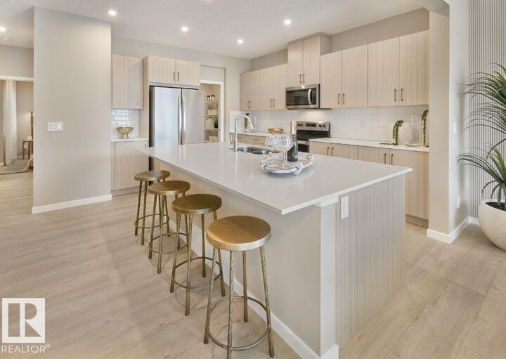 Property Photo: 21132 25 Avenue NW AB T6M 3H1