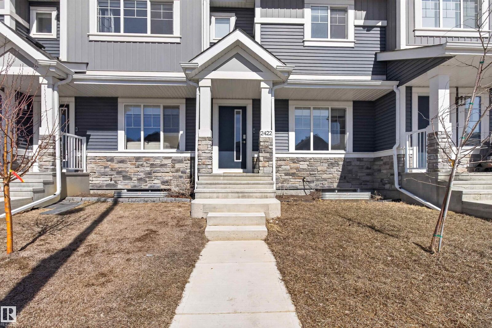 Property Photo: 2422 Trumpeter Way NW AB T5V 1T8