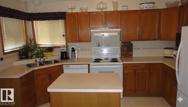 Property Photo: 1188 Joyce Road NW AB T6L 6V4