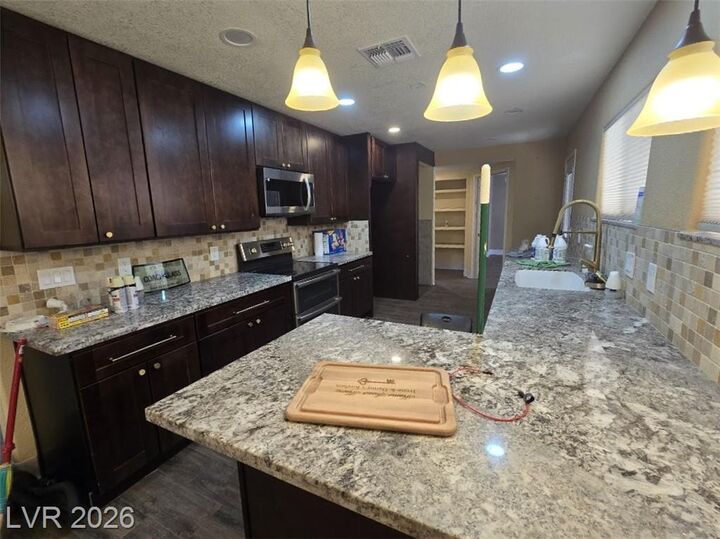 Property Photo:  5785 West Russell Road  NV 89118 