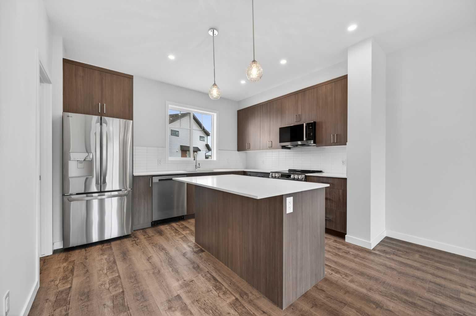 Property Photo: 28 Red Embers Plaza NE 105 AB T3N 2W1