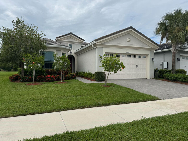 Property Photo: 16117 Whippoorwill Circle FL 33470