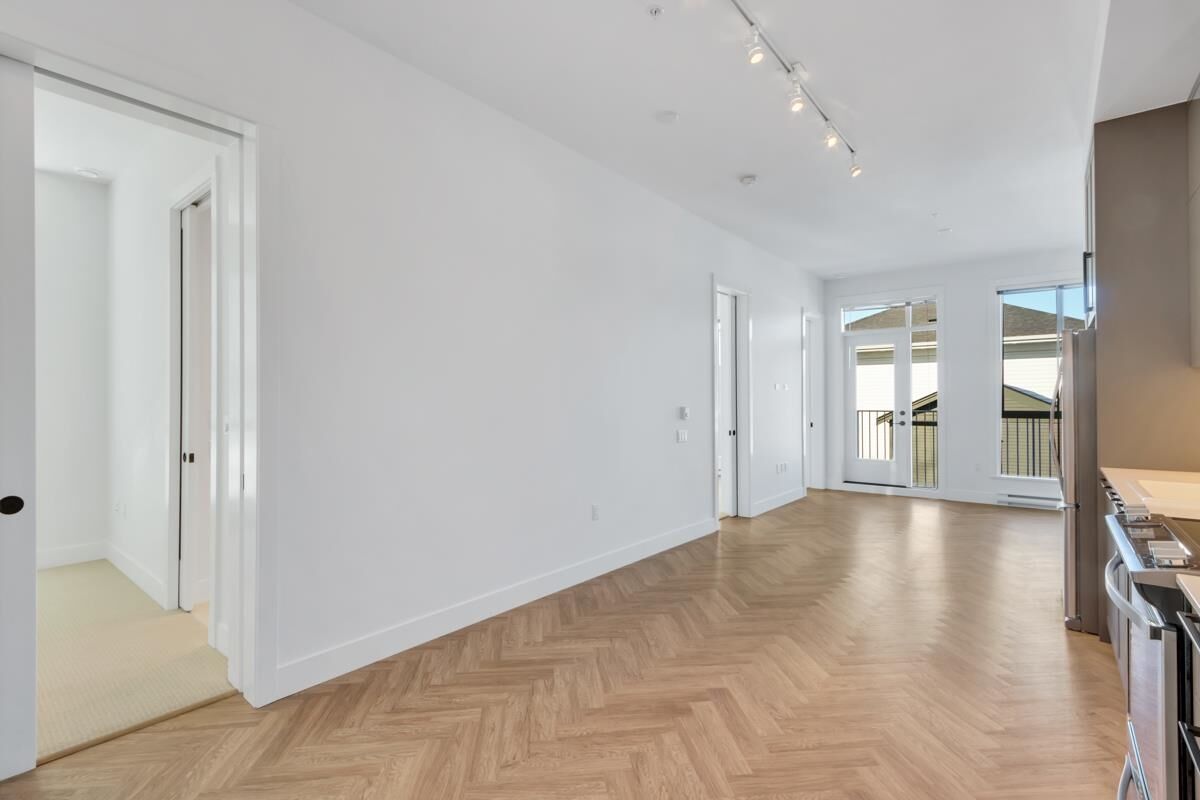 Property Photo:  14968 101A Avenue 310  BC V3R 0T1 