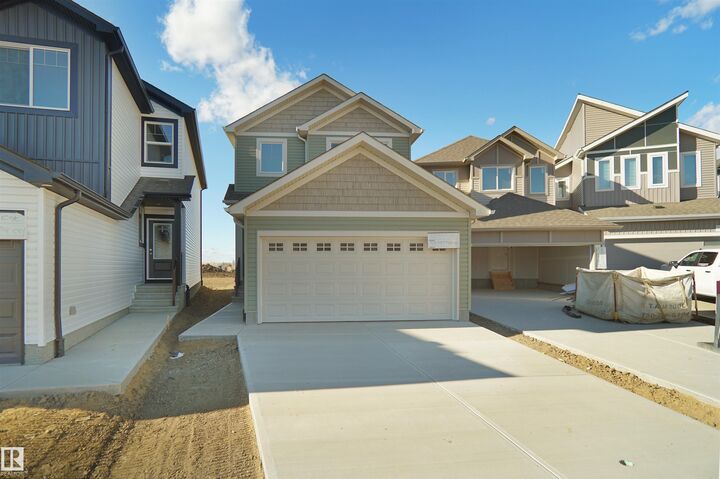 Property Photo:  20928 16 Avenue NW  AB T6W 5G7 