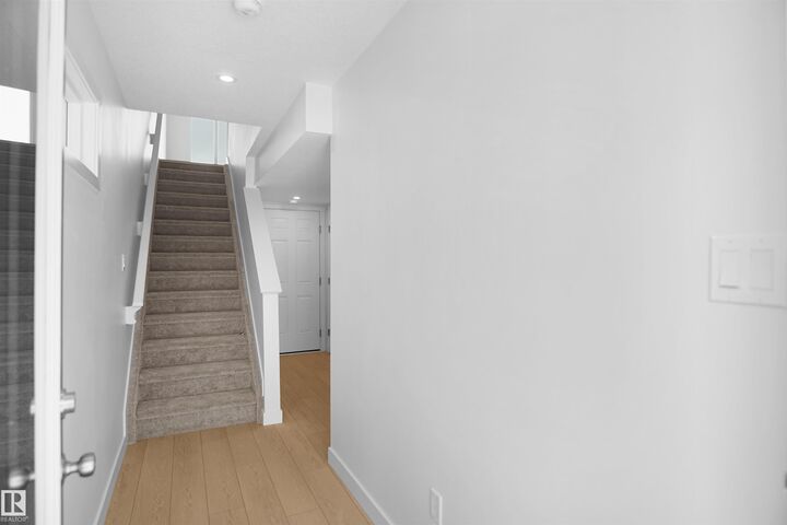 Property Photo:  21032 24 Avenue NW  AB T6M 3L5 