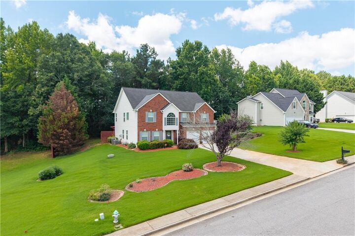 Property Photo:  1835 Winding Crossing Trail  GA 30213 