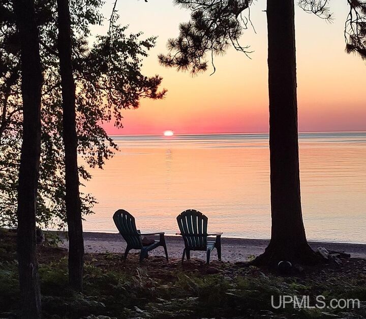 Property Photo:  5877 Five Mile Point Road  MI 49805 