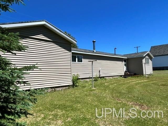 Property Photo:  124 Stanton Avenue  MI 49950 