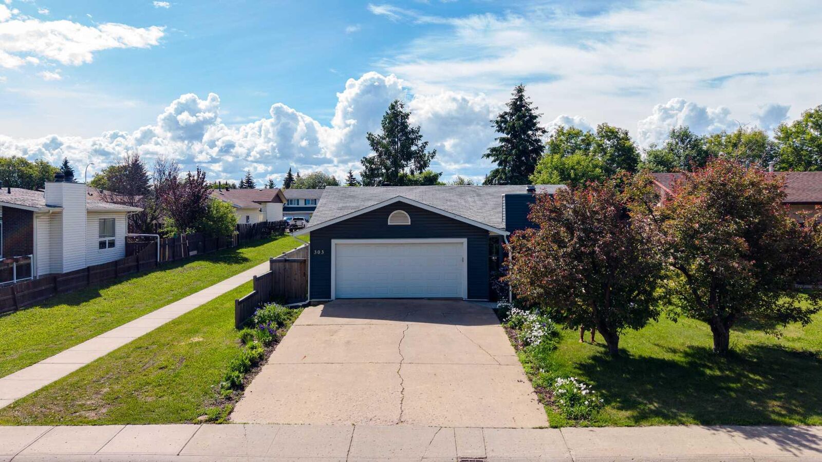 Property Photo: 303 Cornwall Drive AB T9K 1G7