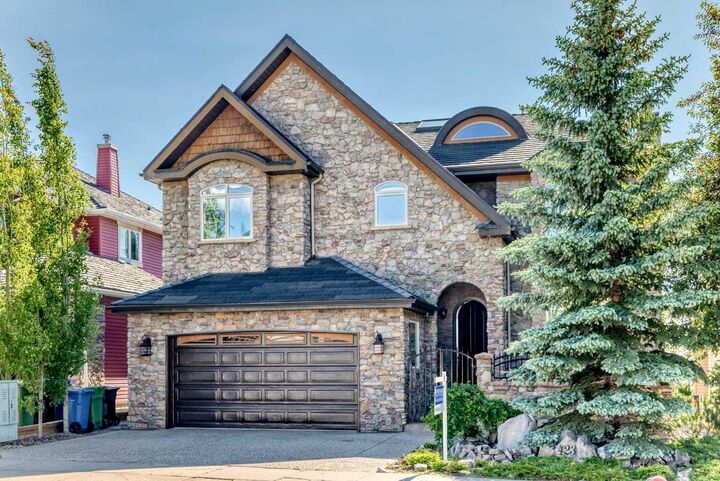 Property Photo: 423 Rocky Ridge Drive NW AB T3G 5C2