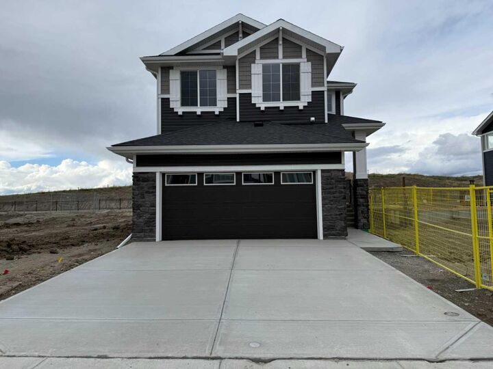 Property Photo: 147 Sundown Crescent AB T4C 1Y3