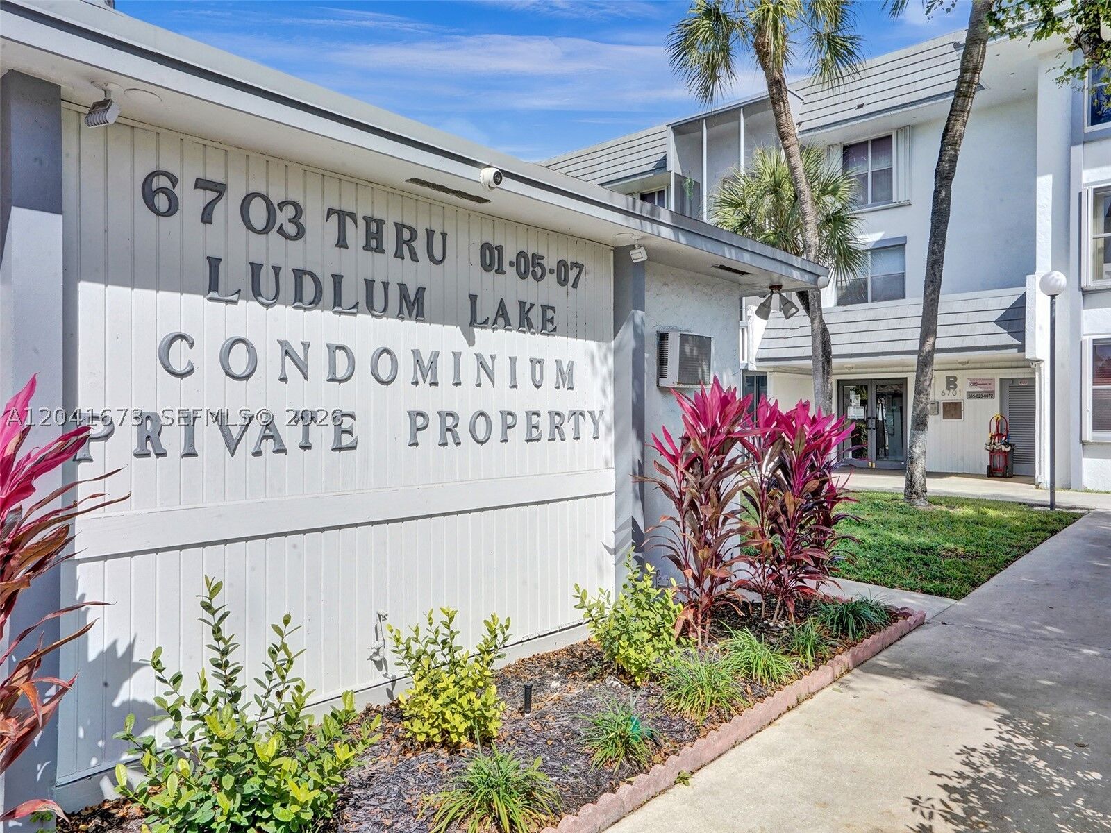 Property Photo:  6705 NW 169th St C112  FL 33015 