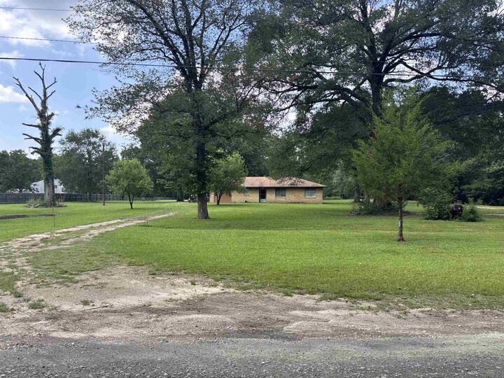 Property Photo:  52 County Road 1875  TX 77664 