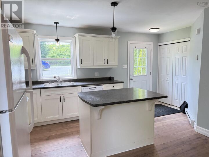 Property Photo:  711 Pleasant Street  NS B2W 1A8 