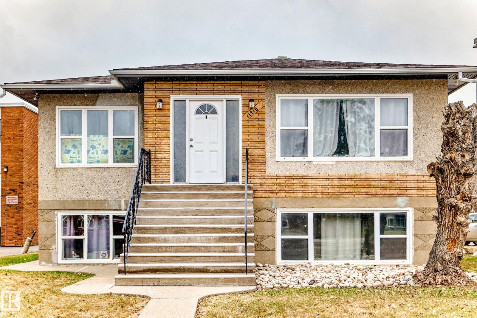 Property Photo: 11716 124 Street NW AB T5M 0K9