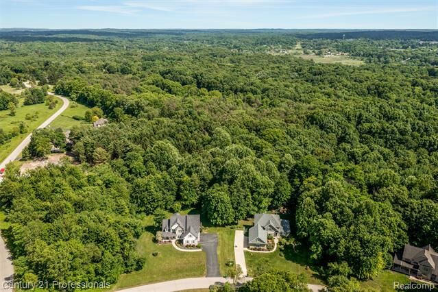 Property Photo:  8928 Wild Iris Court  MI 48350 