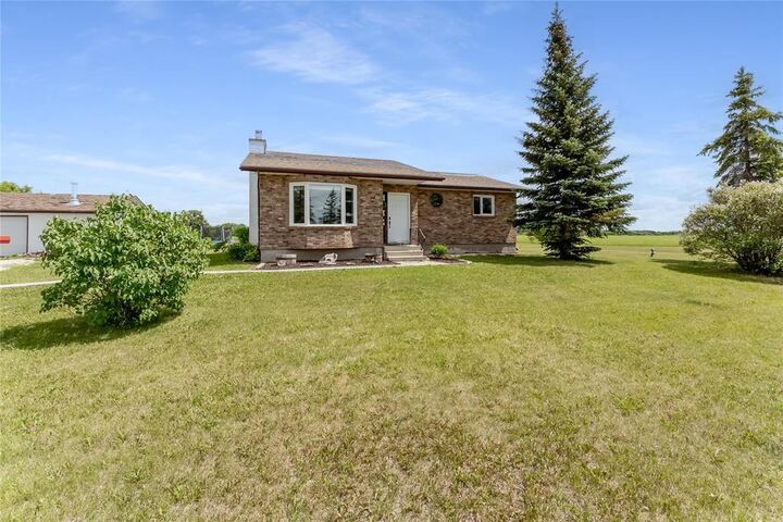 Property Photo:  71081 Dundee Garson Rd 33E Road  MB R0E 0R0 