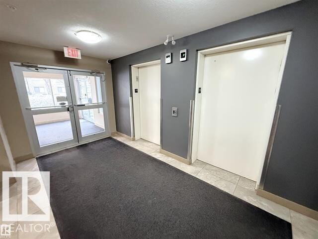 Property Photo: 17003 67 Avenue NW 311 AB T5T 6Y6