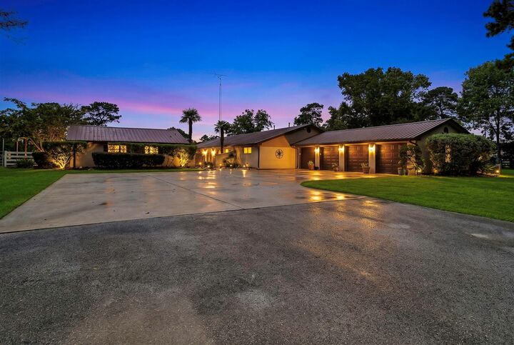 Property Photo:  838 State Highway 150  TX 77358 