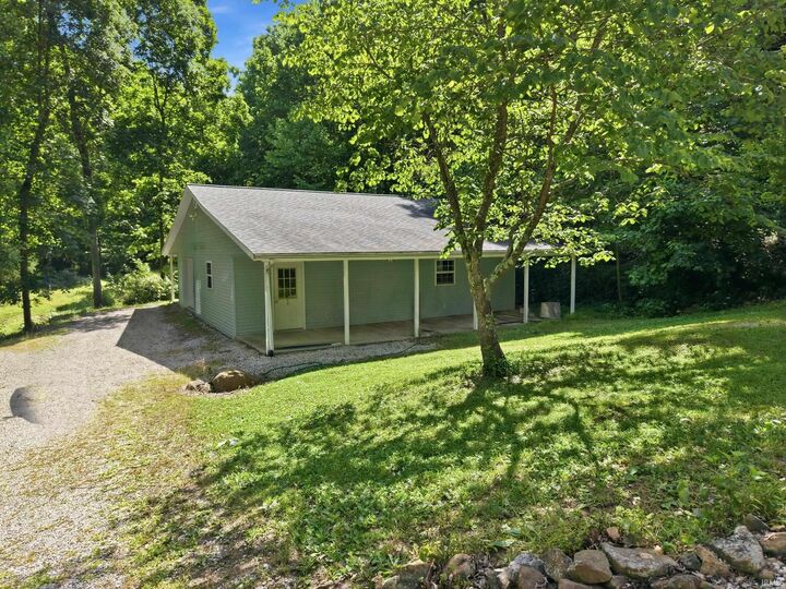 Property Photo:  10804 E State Road 58  IN 47424 