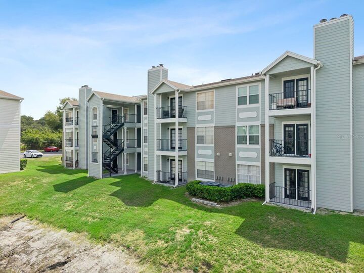 Property Photo:  2550 N Alafaya Trail 7203  FL 32826 