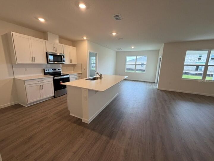 Property Photo:  4922 Marshelder Street  FL 32712 